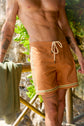 TROPICALE STRIPED BOARDSHORT • OCHRE